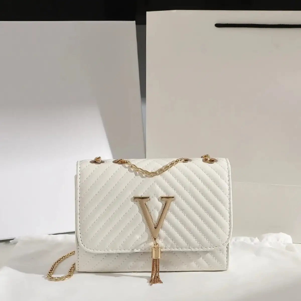 compact quilted crossbody purse for parties and evenings white