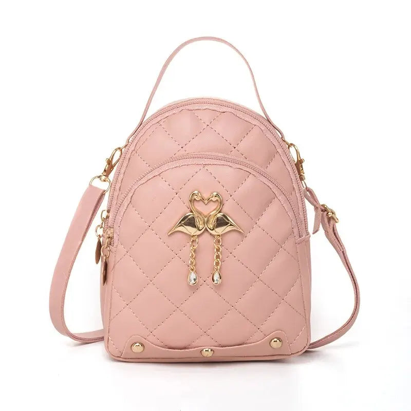 mini quilted faux leather backpack with swan charm
