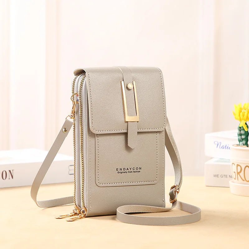 travel-friendly phone crossbody purse with touchscreen slot