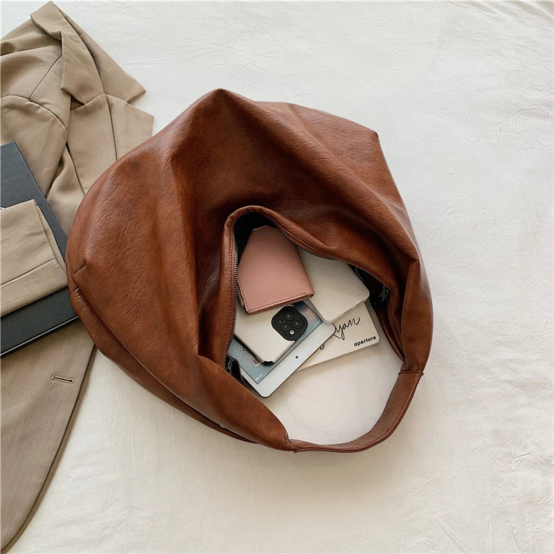 durable vegan leather shoulder tote with zipper closure