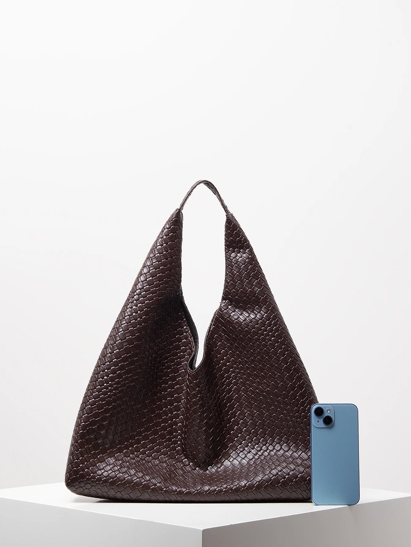 Minimalist vegan leather shoulder tote with woven texture