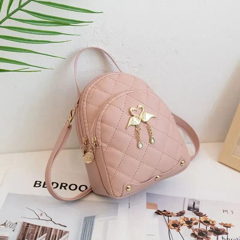 compact lightweight quilted faux leather backpack
