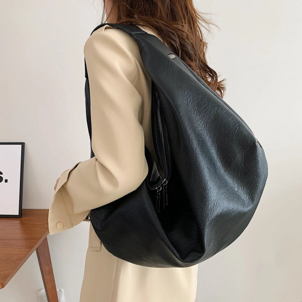 stylish faux leather hobo tote with minimalist design
