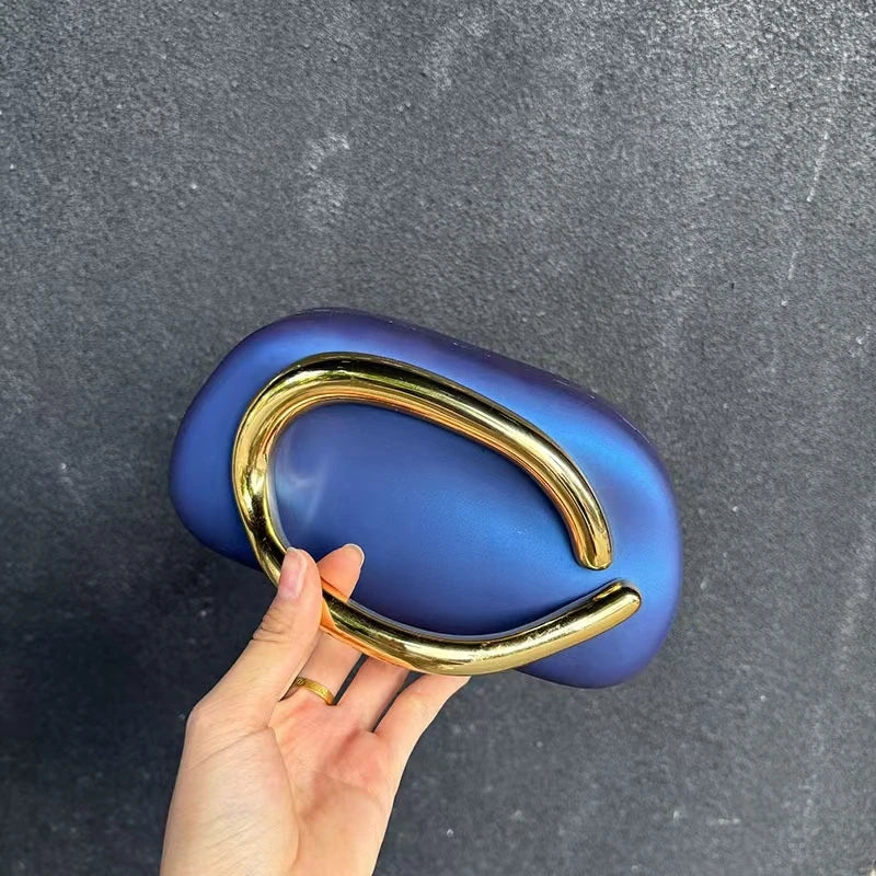 modern formal clutch handbag with golden clasp closure