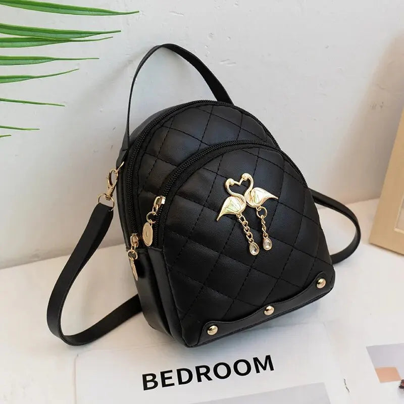 elegant mini quilted faux leather backpack with charm
