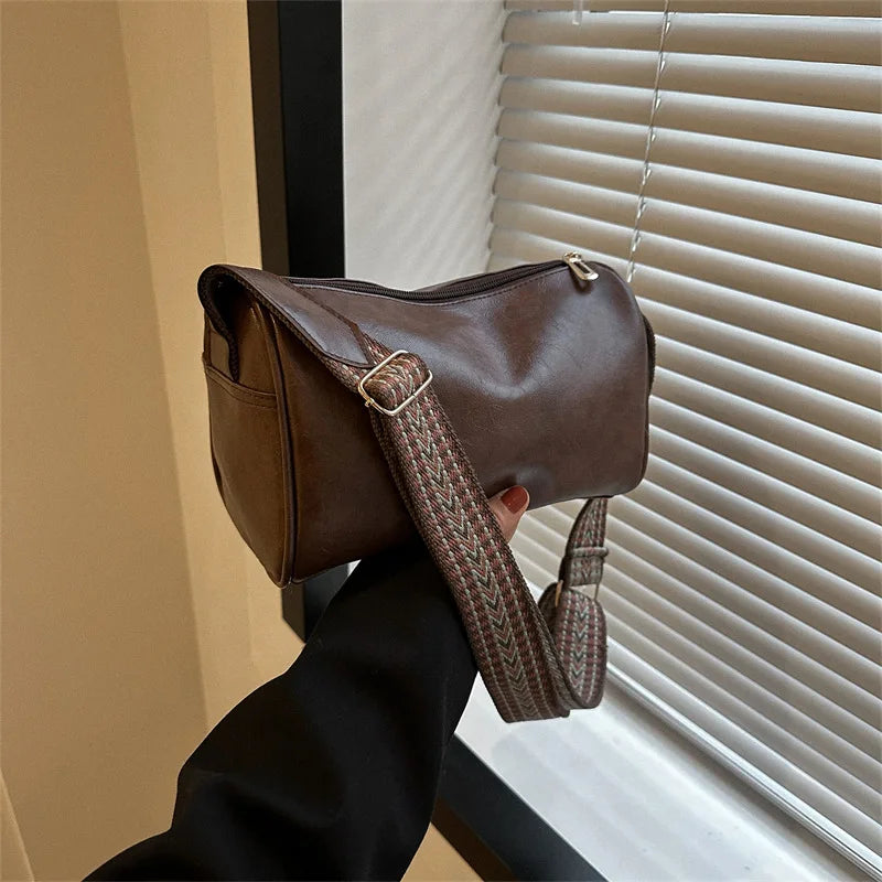 trendy vintage faux leather handbag with glossy finish