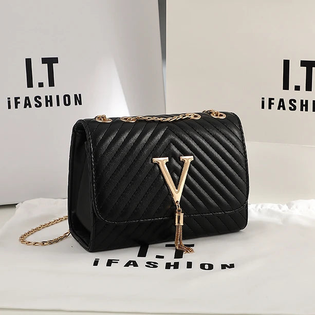 faux leather quilted crossbody purse with V hardware