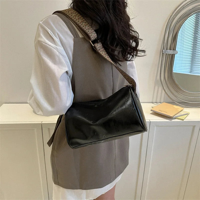 soft faux leather vintage handbag with wide adjustable strap