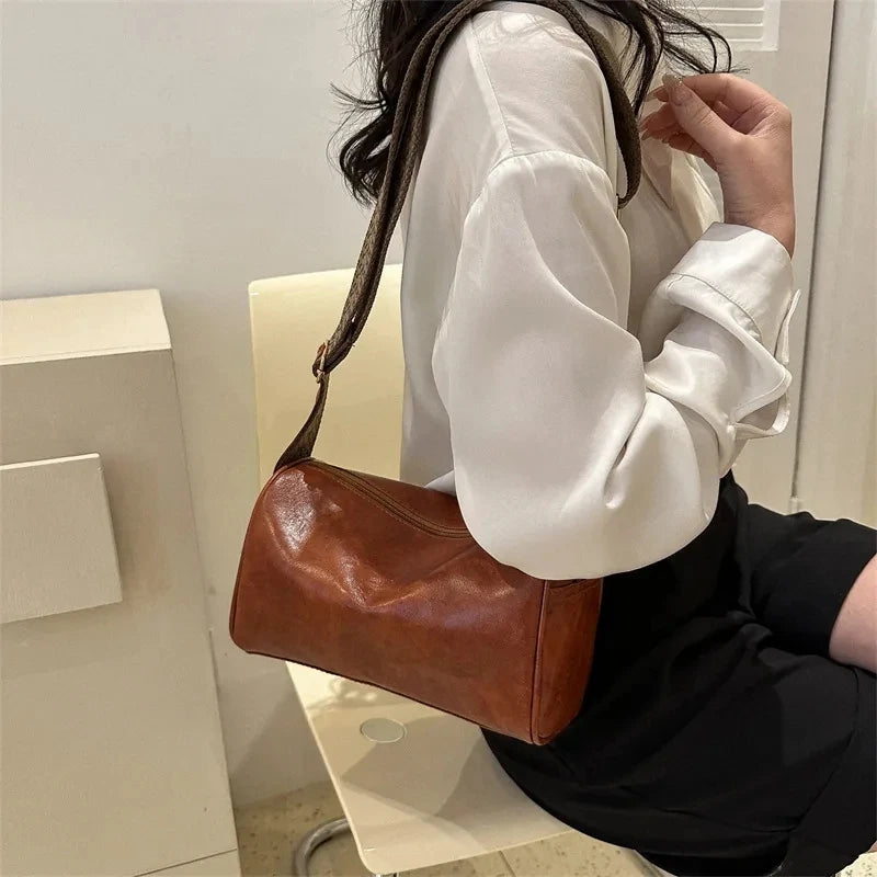 compact faux leather boston style crossbody for daily use