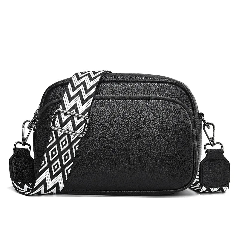minimalist vegan leather crossbody bag with bold strap